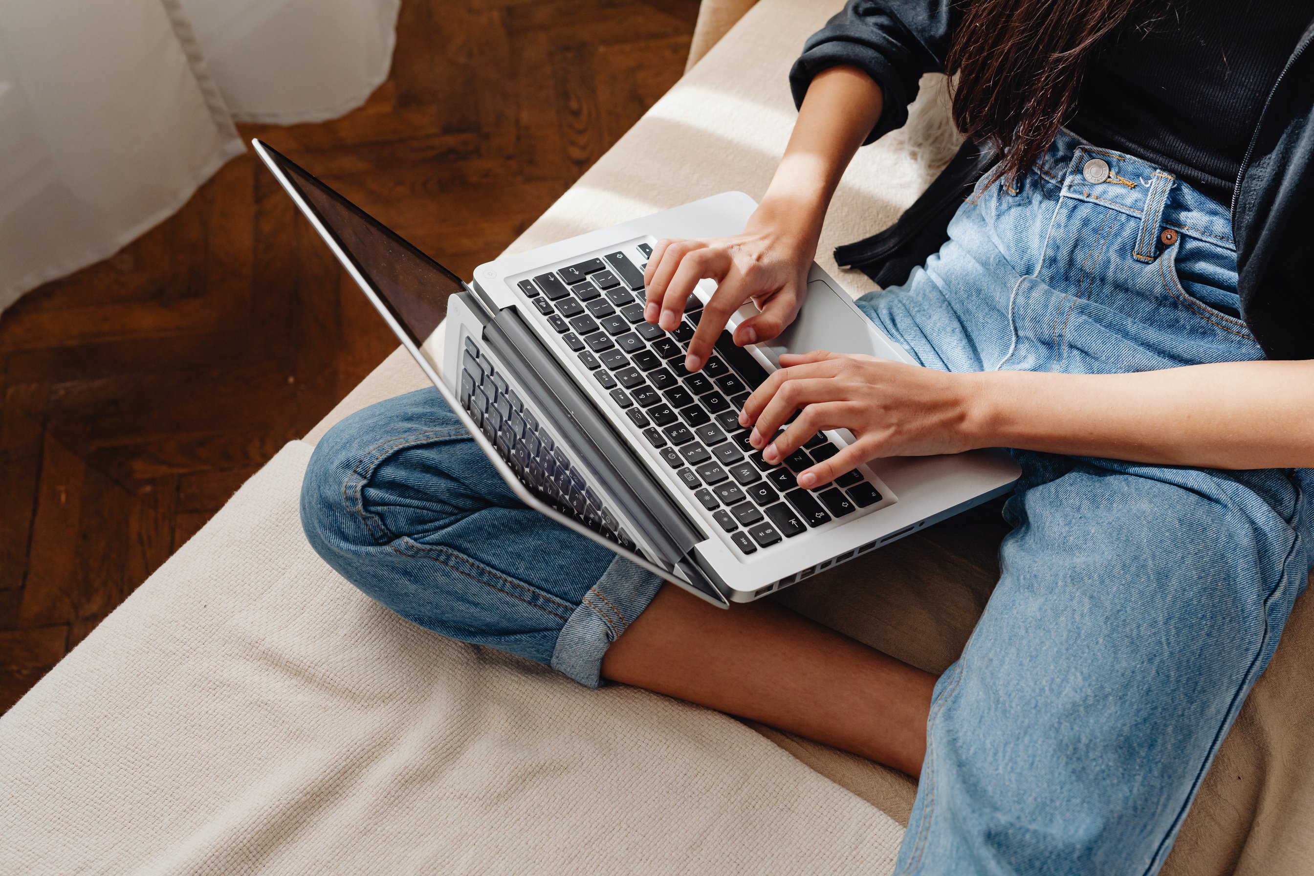 Person Typing on a Laptop